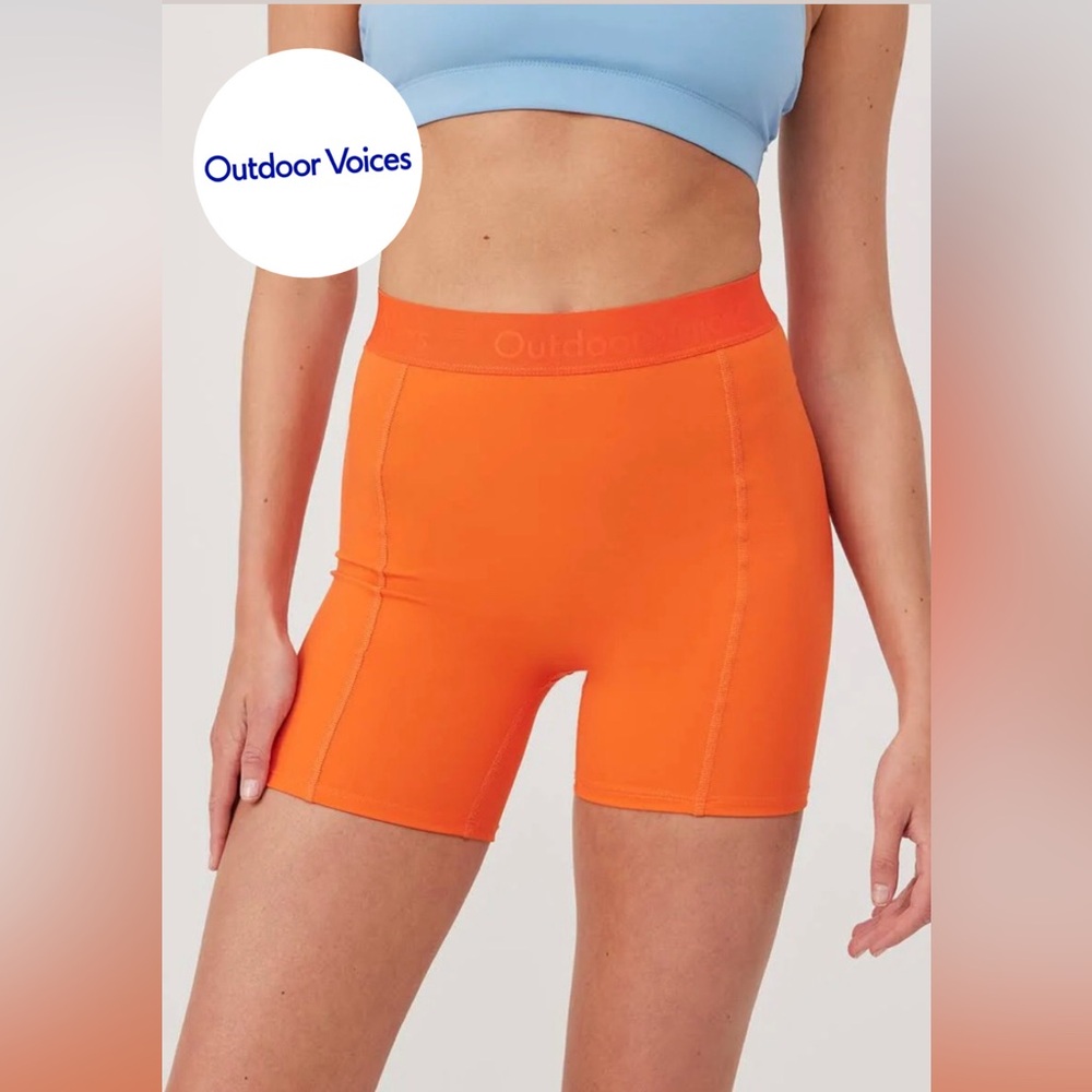 Women's- Outdoor Voices-SuperForm 5"-short. Color Sundance(orange) size small.